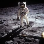 Historic image of an astronaut on the moon during the Apollo mission, showcasing space exploration.